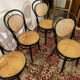 Set of 4 bentwood bistro chairs in black with caning.