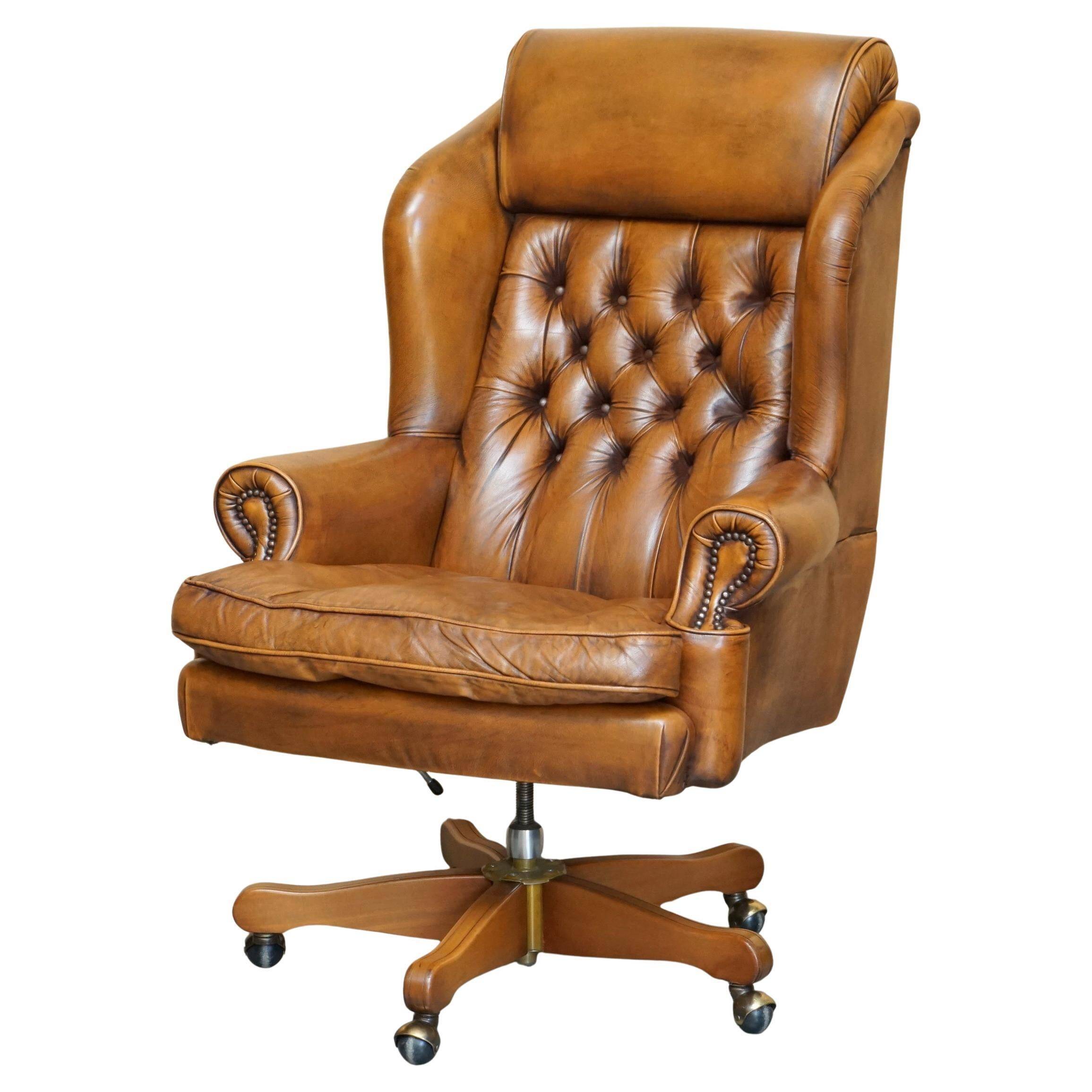 Captain's chair Chesterfield vintage leather with tufted wingback.