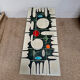 Vintage coffee table from the 60s and 70s in ceramic, chrome metal, and wood.