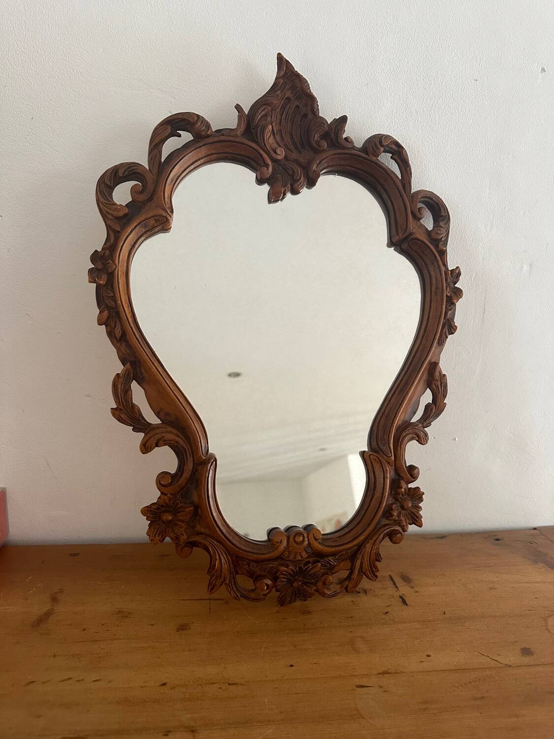 Carved wooden mirror