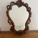 Carved wooden mirror