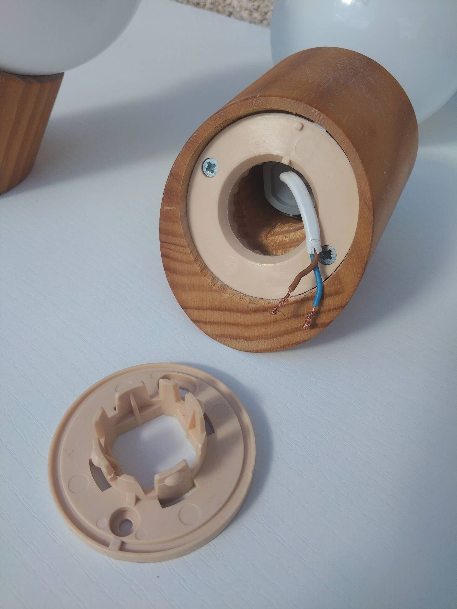 Pair of vintage wall lights in varnished pine and opal glass, 1970s-80s.
