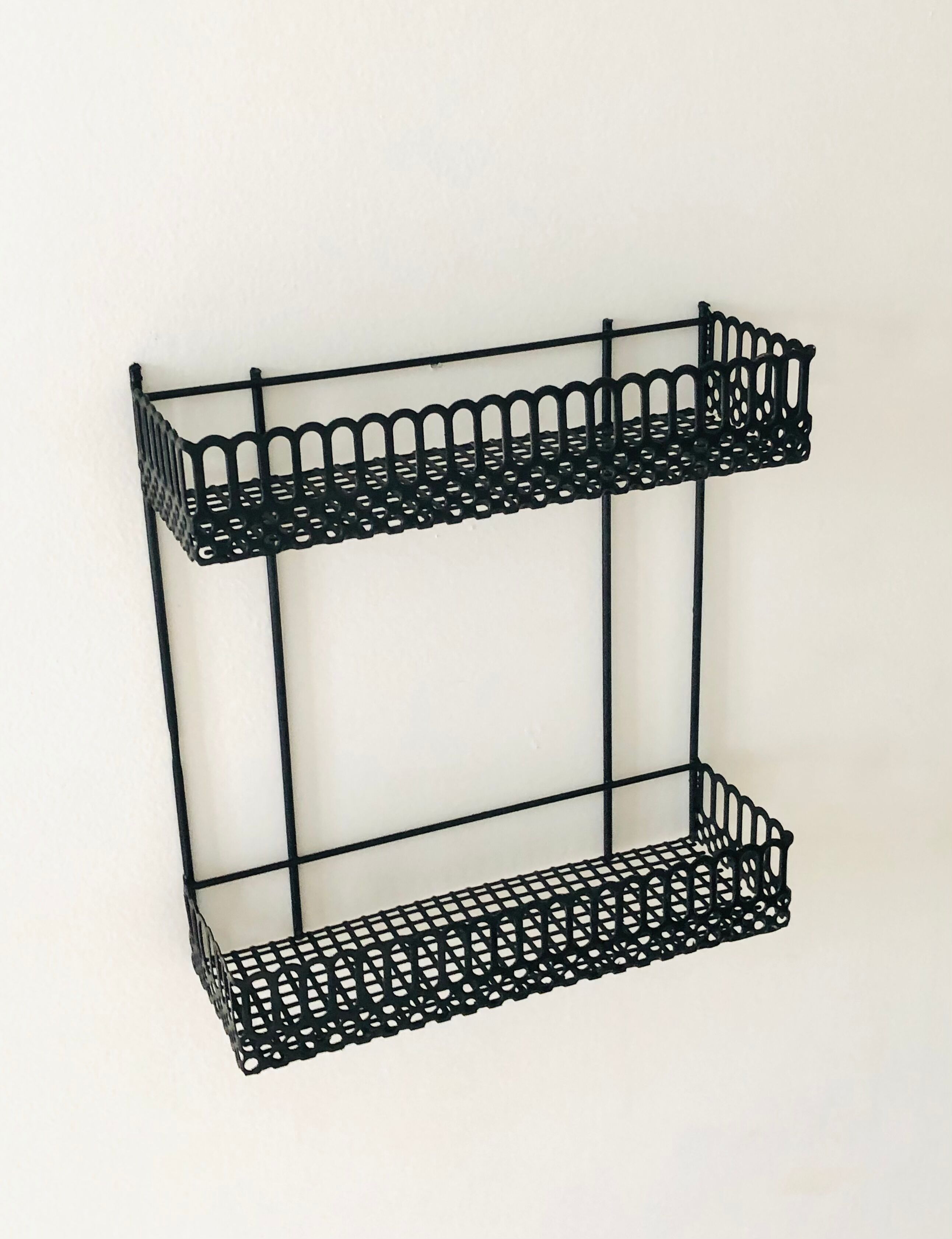 Vintage black metal wall shelf