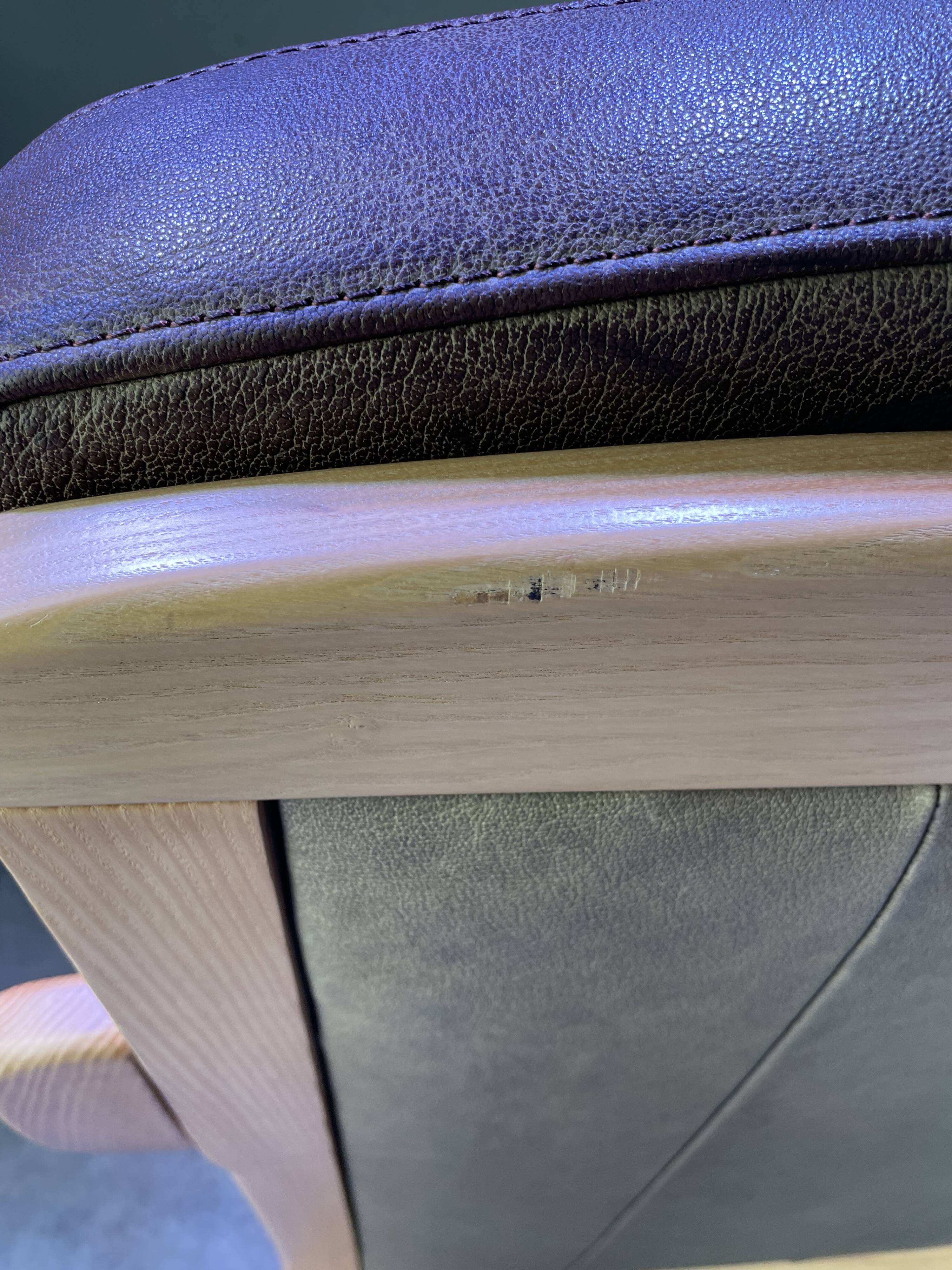 Chocolate leather armchair, wooden structure