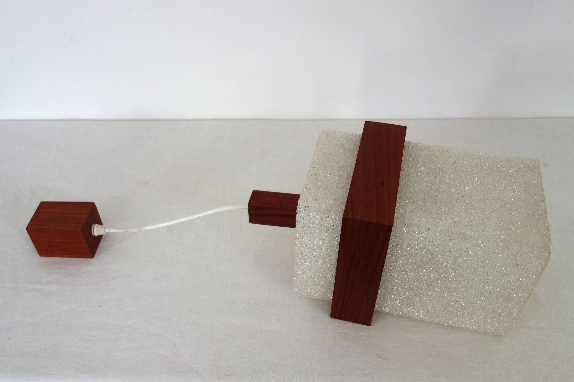 Scandinavian suspension in perspex and teak from the 60s/70s.