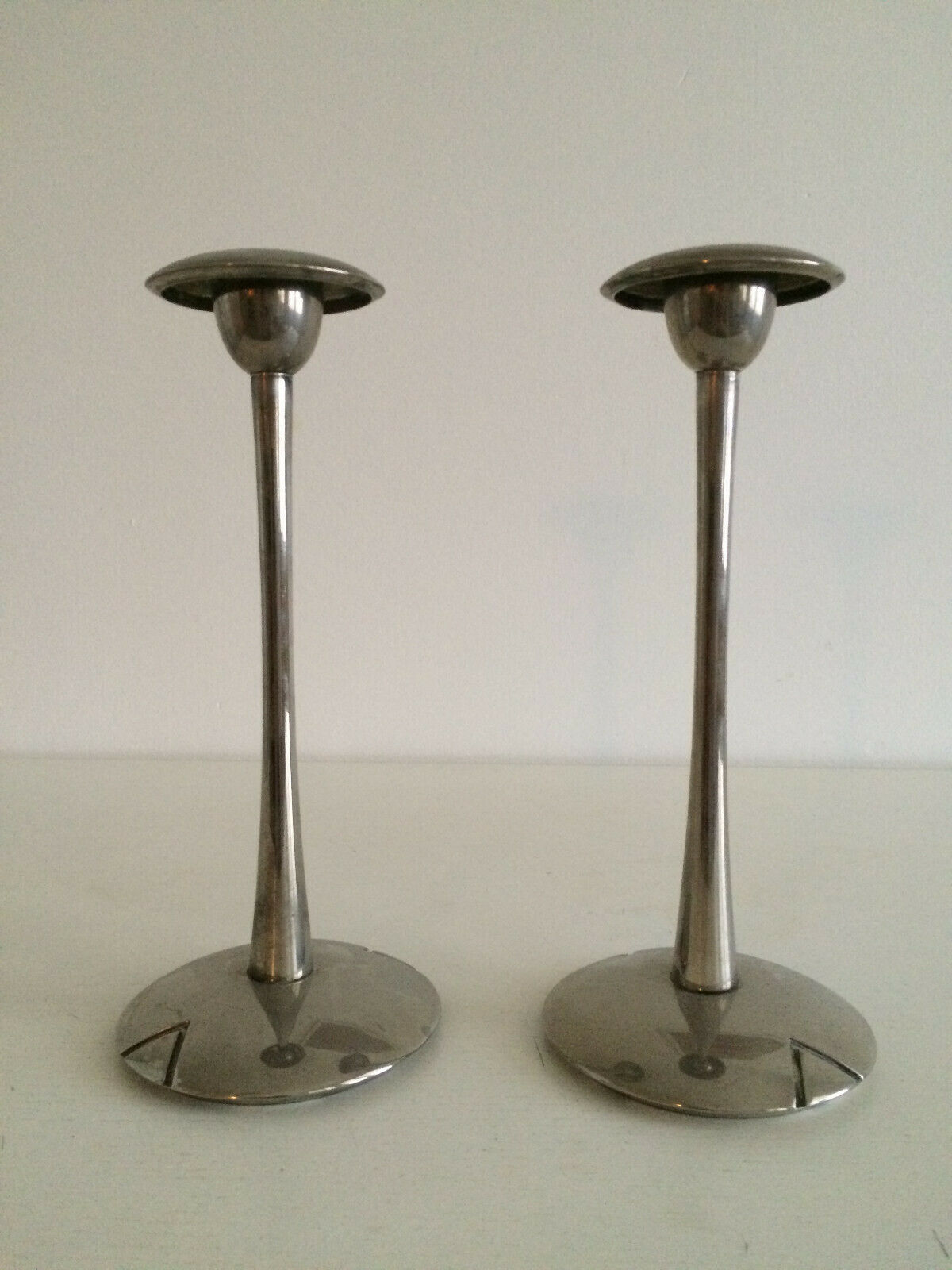 Pair of silver style Deco candlesticks