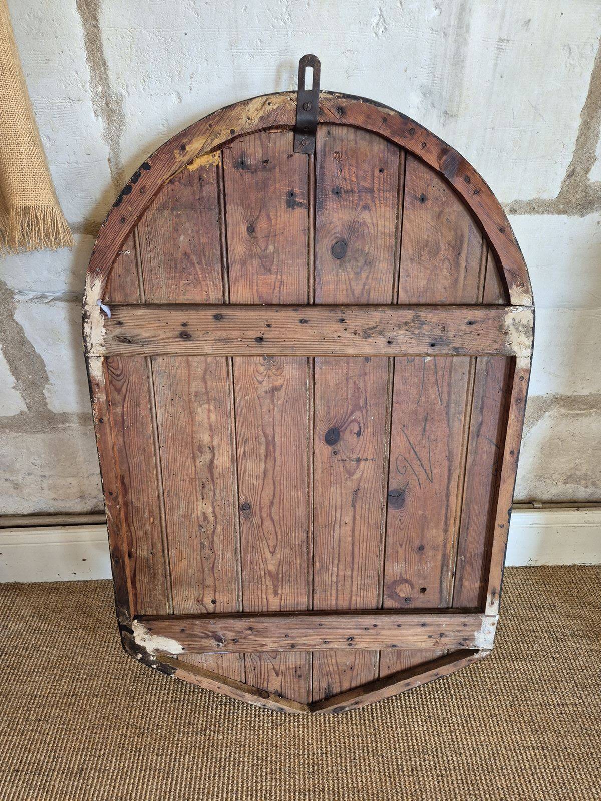 Ancient bas-relief in wood and stucco