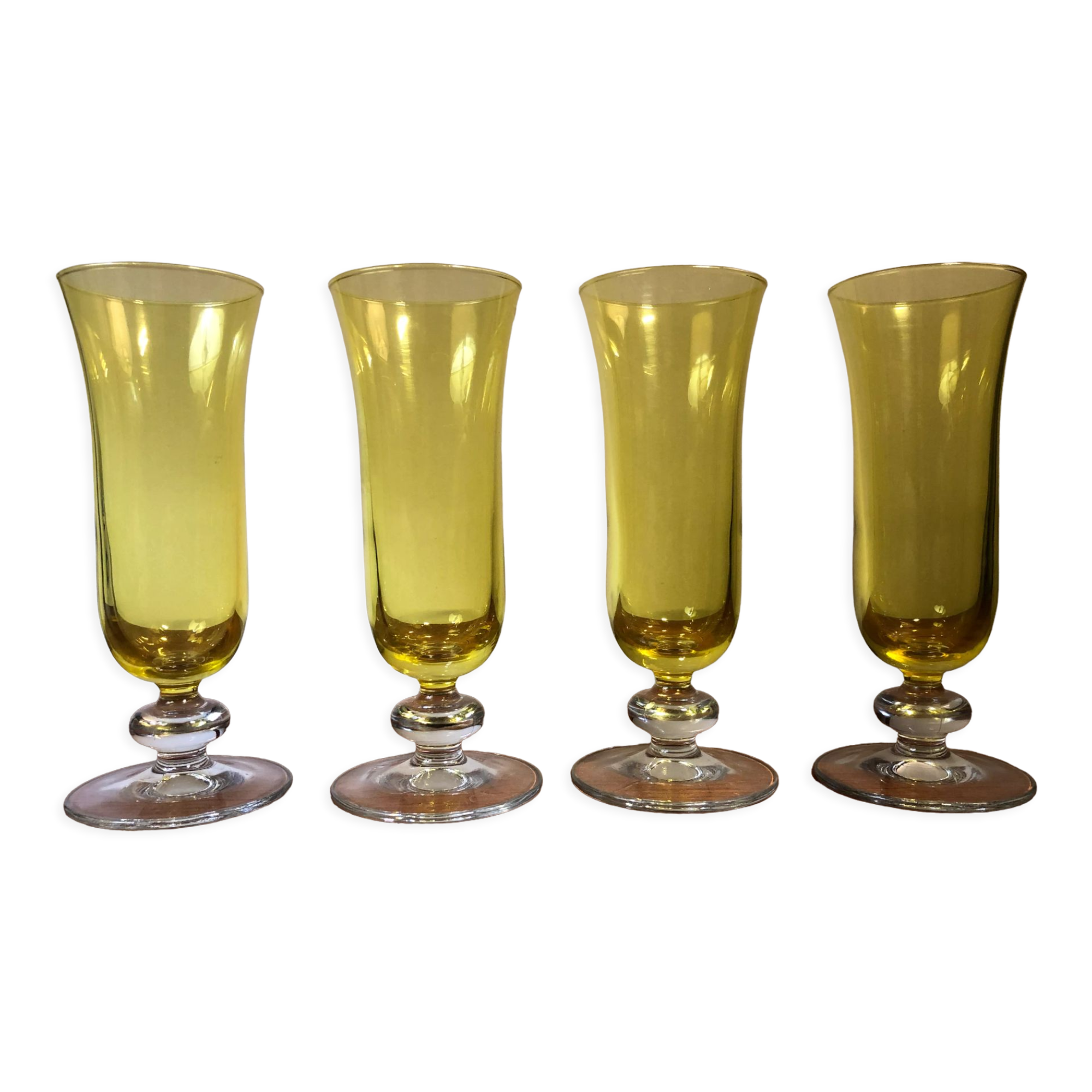 Large transparent yellow champagne flutes