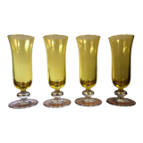Large transparent yellow champagne flutes