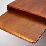 Extendable coffee table designed by Johannes Andersen for Uldum Møbelfabrik, Denmark, 1960s.