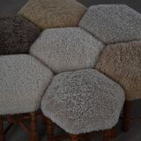 Pair of mid-century Danish oak stools with shearling lambswool upholstery, 1950s.