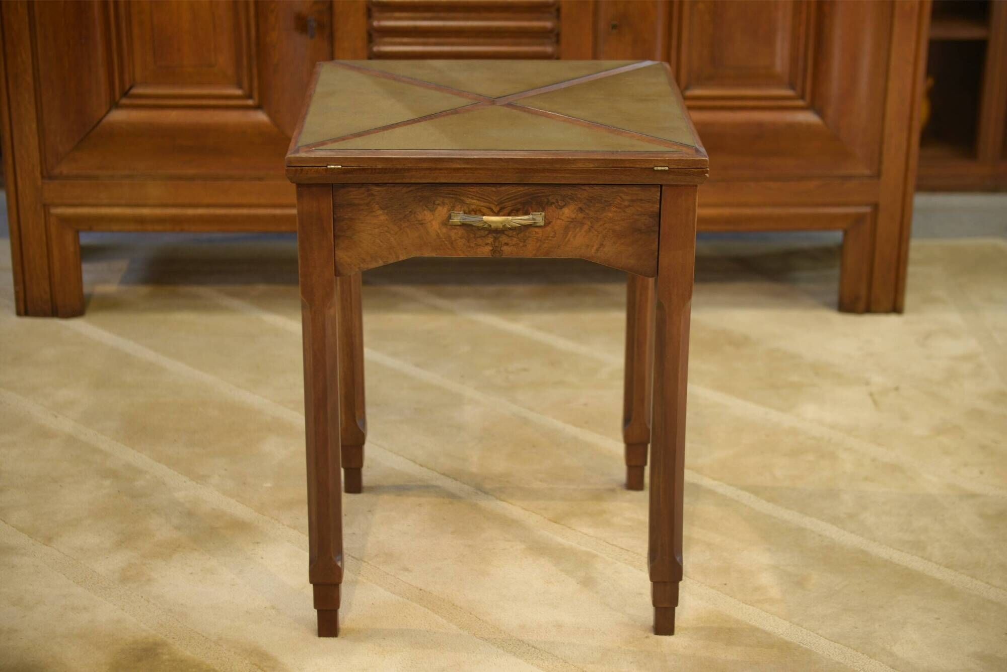 Art Deco game table in walnut from the 1930s.