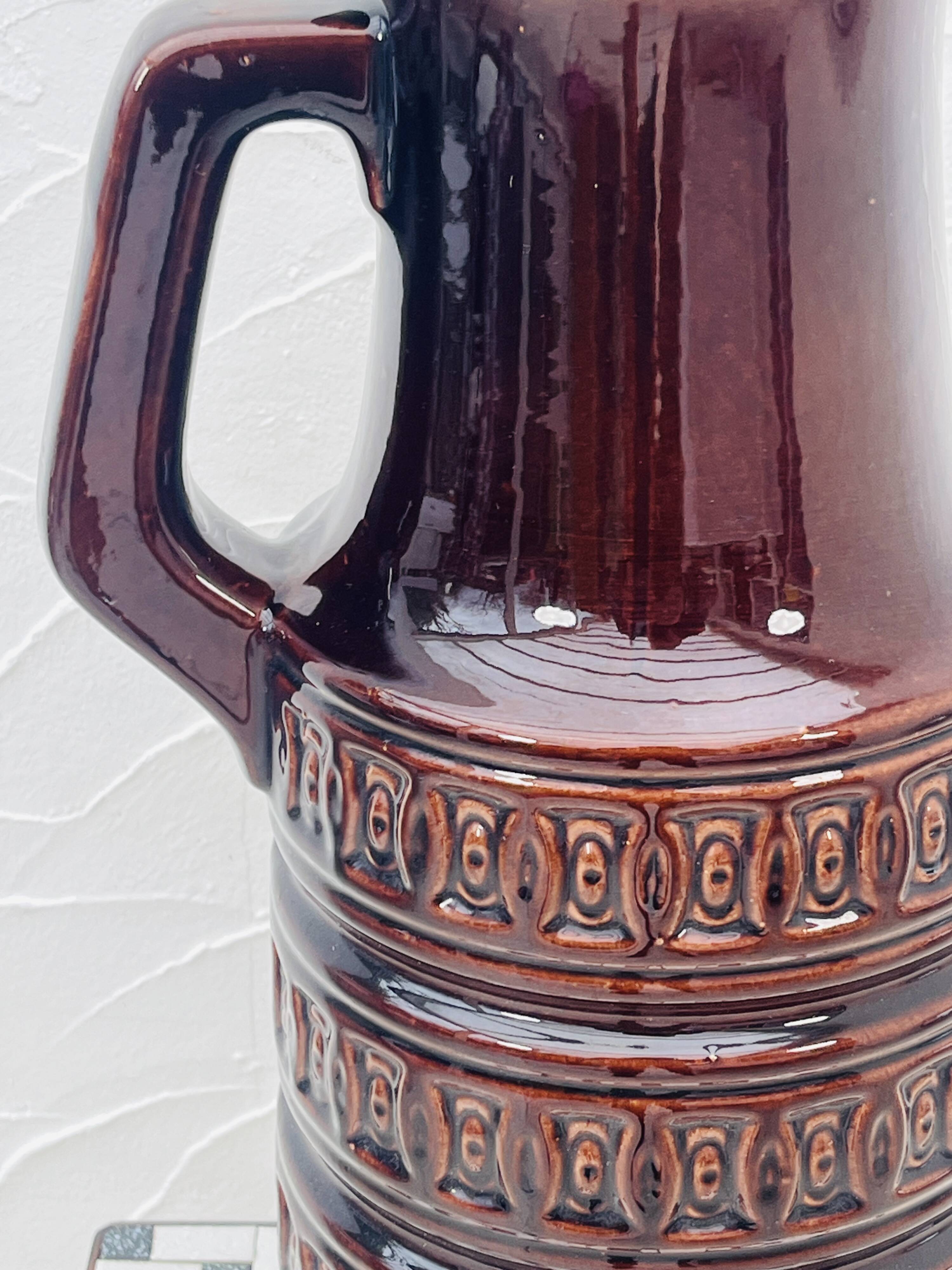 Vase West Germany brown with geometric relief from the 1970s.