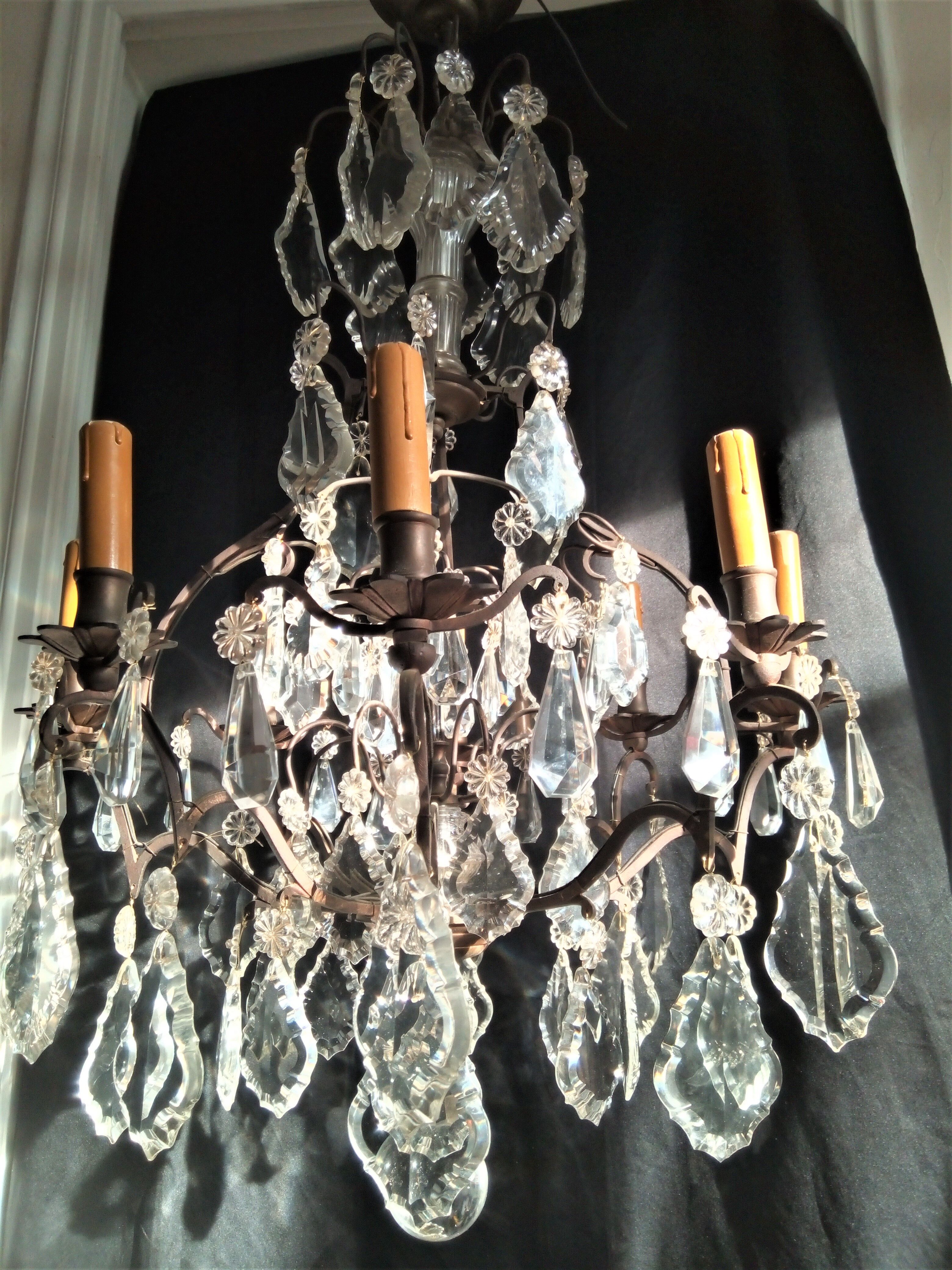 Old chandelier with tassels, bronze and crystal, 8 lights. Louis XV style.