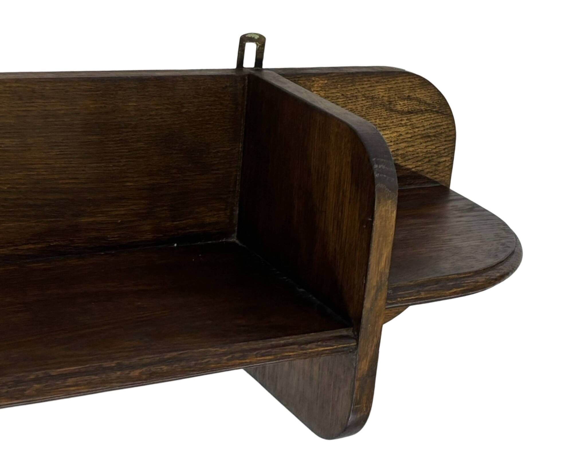 Vintage wooden wall shelve rack bookshelf in dark oak wood minimalist