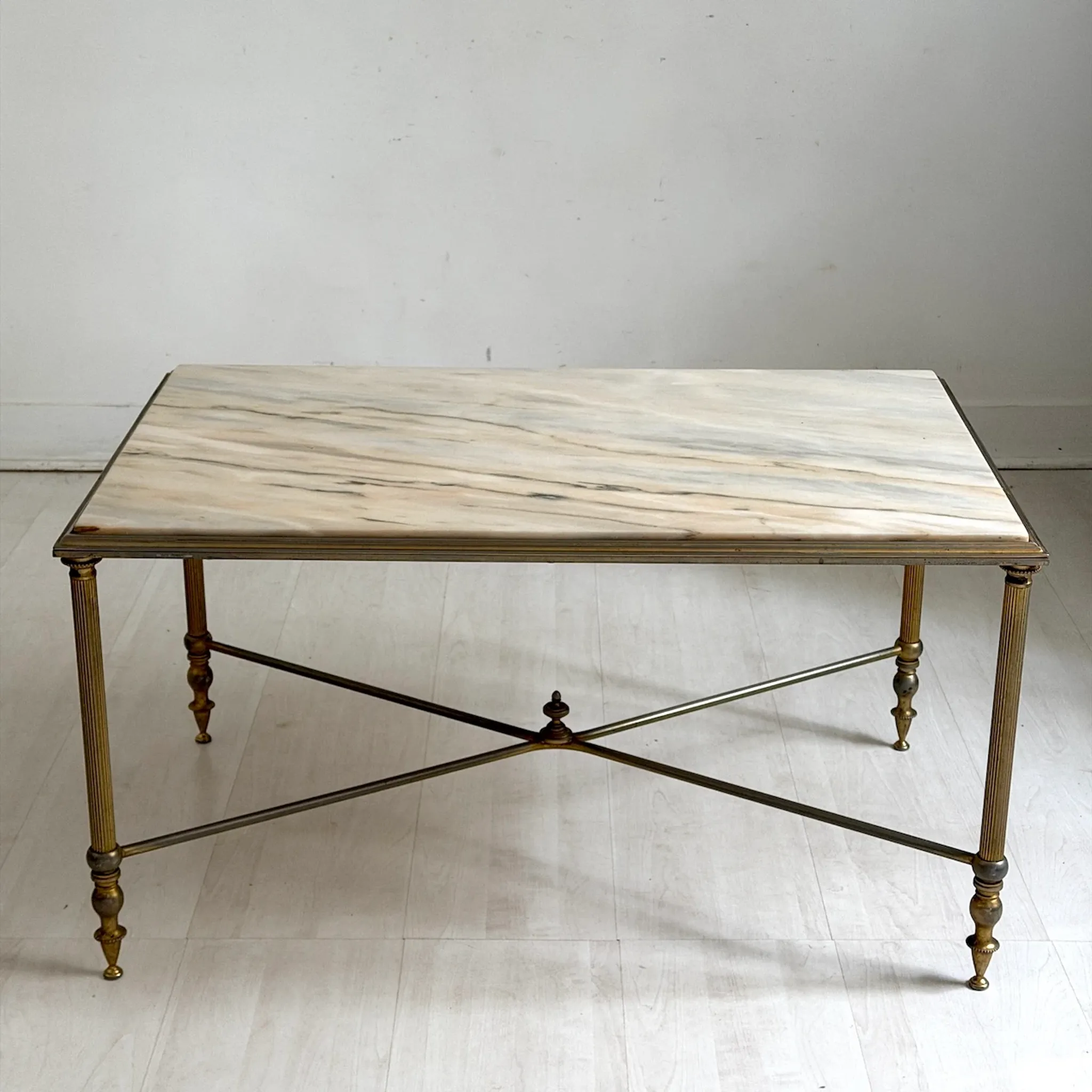 Vintage coffee table in 1970s neoclassical style.