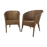 Paire de fauteuil Lloyd Loom doré