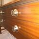 Avalon sideboard in brown teak veneer, chrome handles and wooden legs, 1960s.