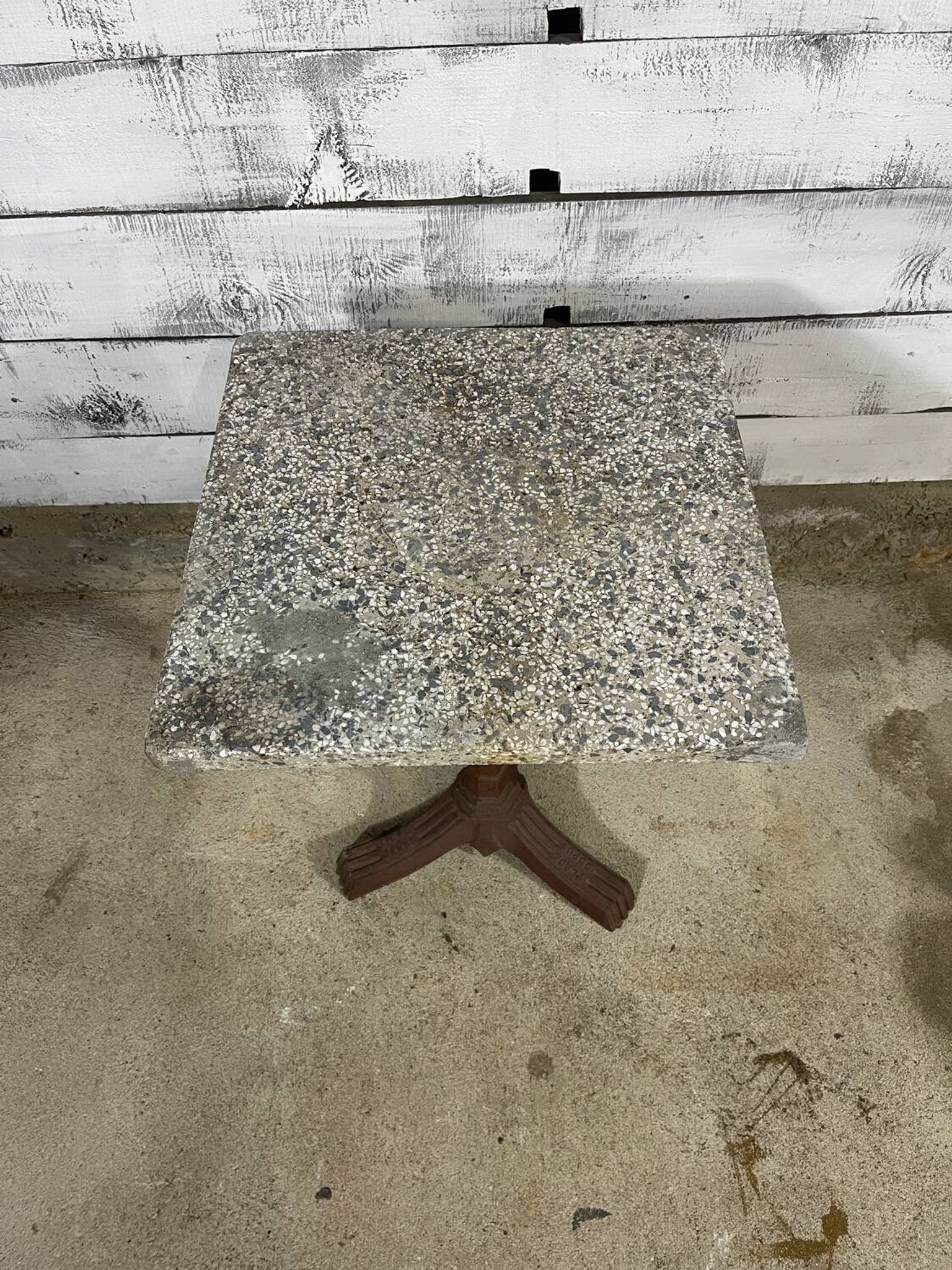 Bistro table with a cast iron base