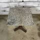 Bistro table with a cast iron base