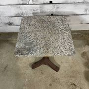 Bistro table with a cast iron base