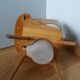 Baumann Baby Coquille children's armchair in bent wood with splayed legs.