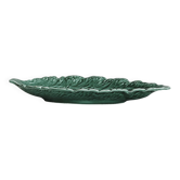 Green earthenware dish in the shape of a leaf