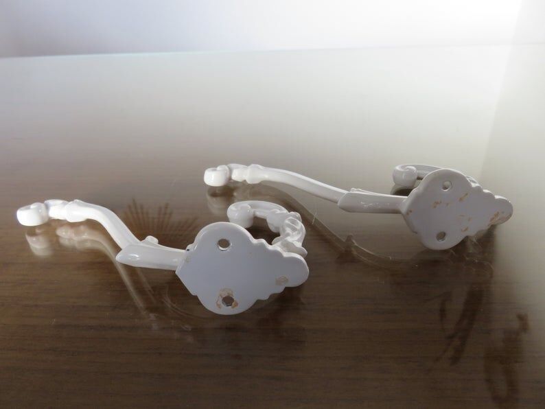 2 white cast iron pads art deco 30s 40s