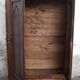 Antique solid wood wardrobe in historical rustic style from the 19th century.