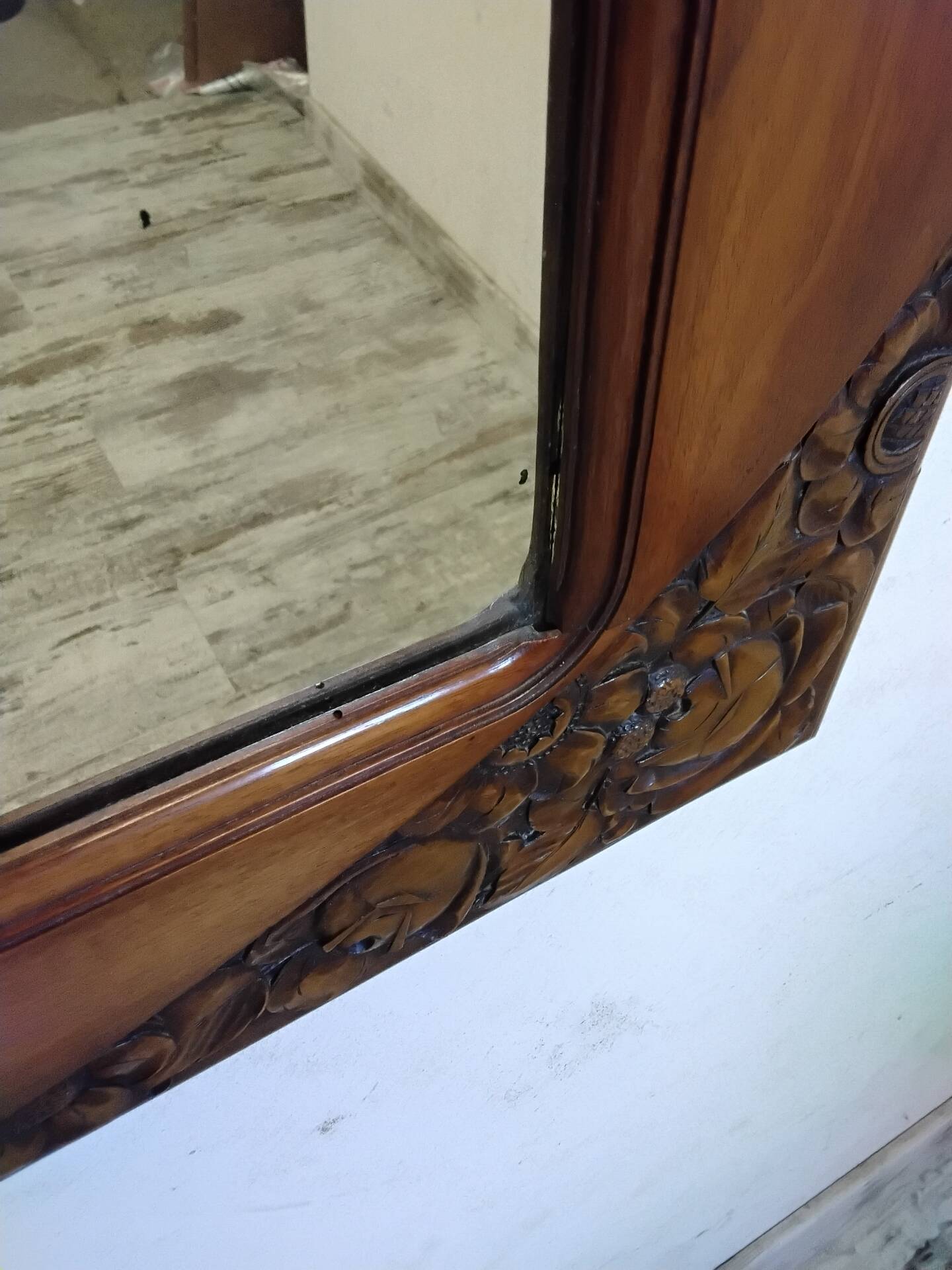 Art Deco mirror with a wooden frame