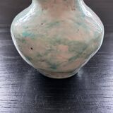 Green and white signed vase