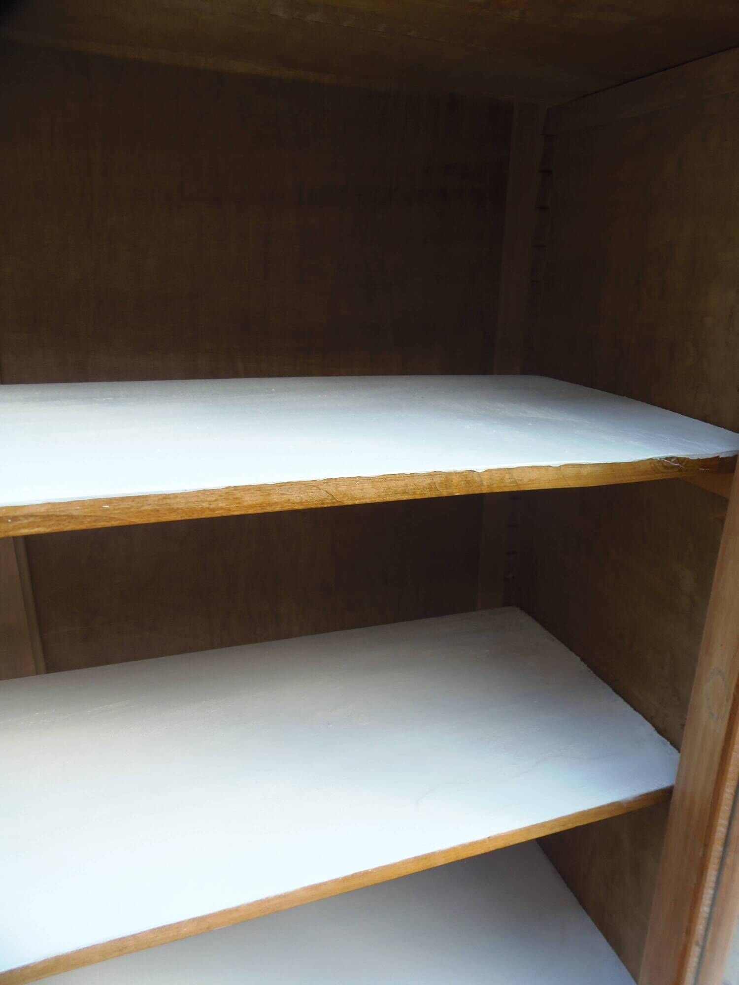 Charming vintage display cabinet from the 1950s in natural wood.