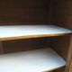 Charming vintage display cabinet from the 1950s in natural wood.