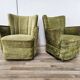 Deux fauteuils cocktail en tissu vert des années 1950 à roulettes