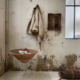 Wicker garden basket on tripod support