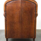 Charming and rugged sheepskin leather armchair, large model