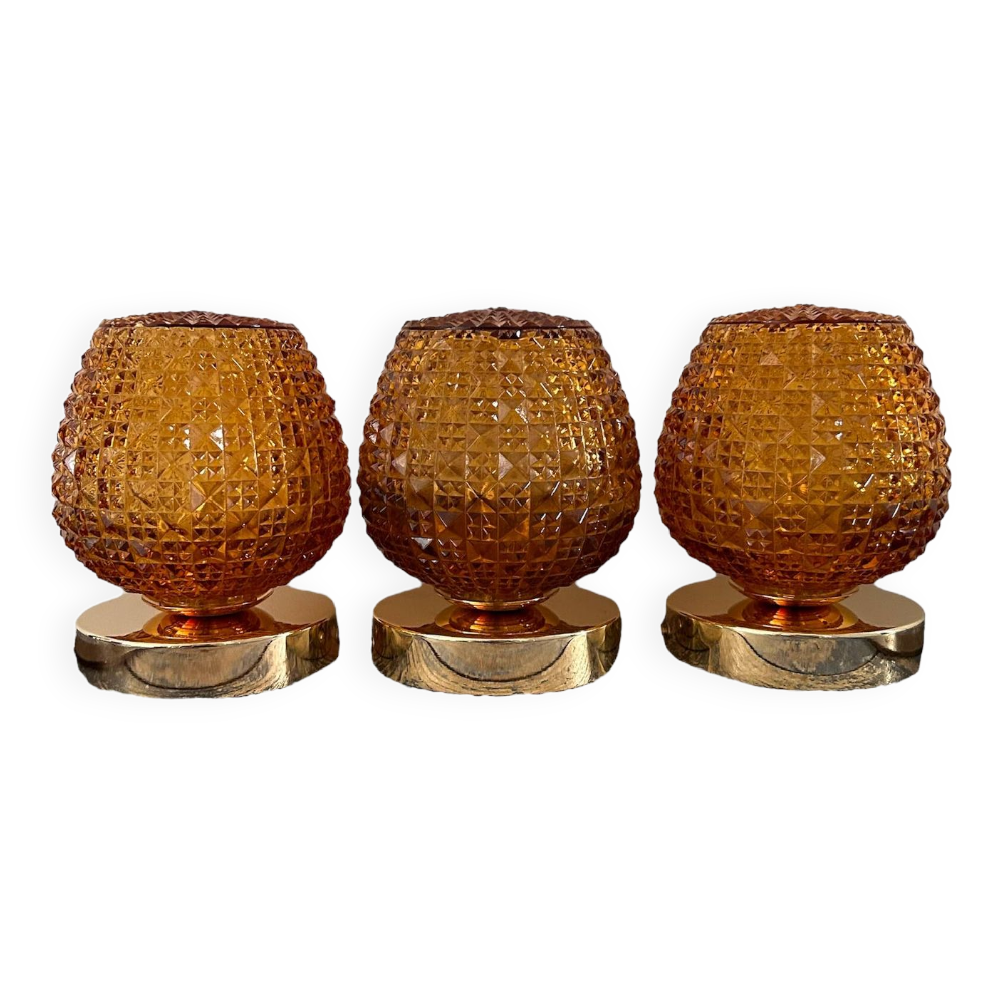 Set of three vintage wall or ceiling lights in amber chiseled glass
