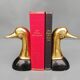 Pair of brass book greenhouses