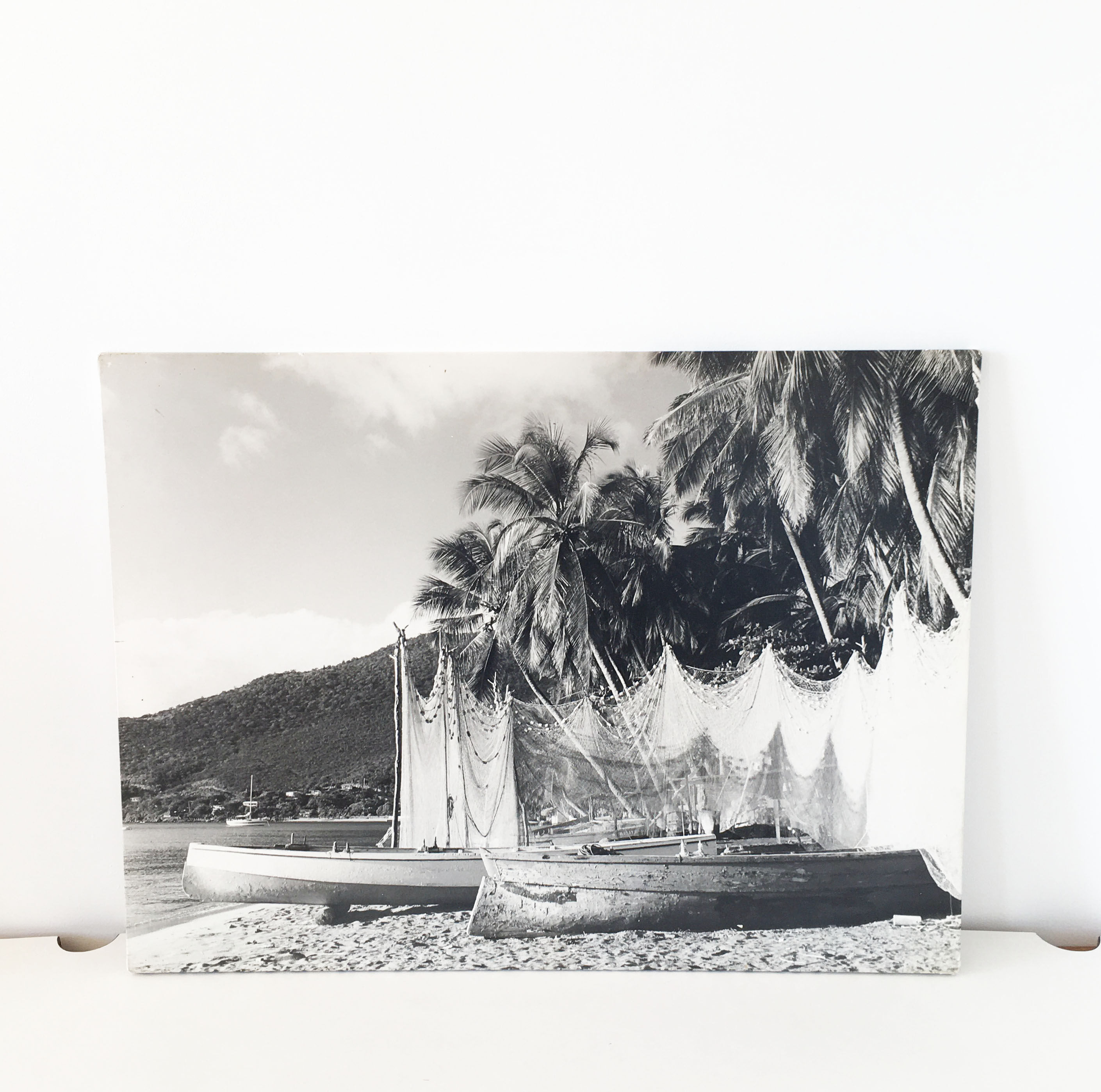 Old photograph on wood panel