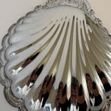 Large silver-plated serving dish in the shape of a vintage shell.