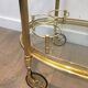 Oval brass trolley from Maison Baguès.