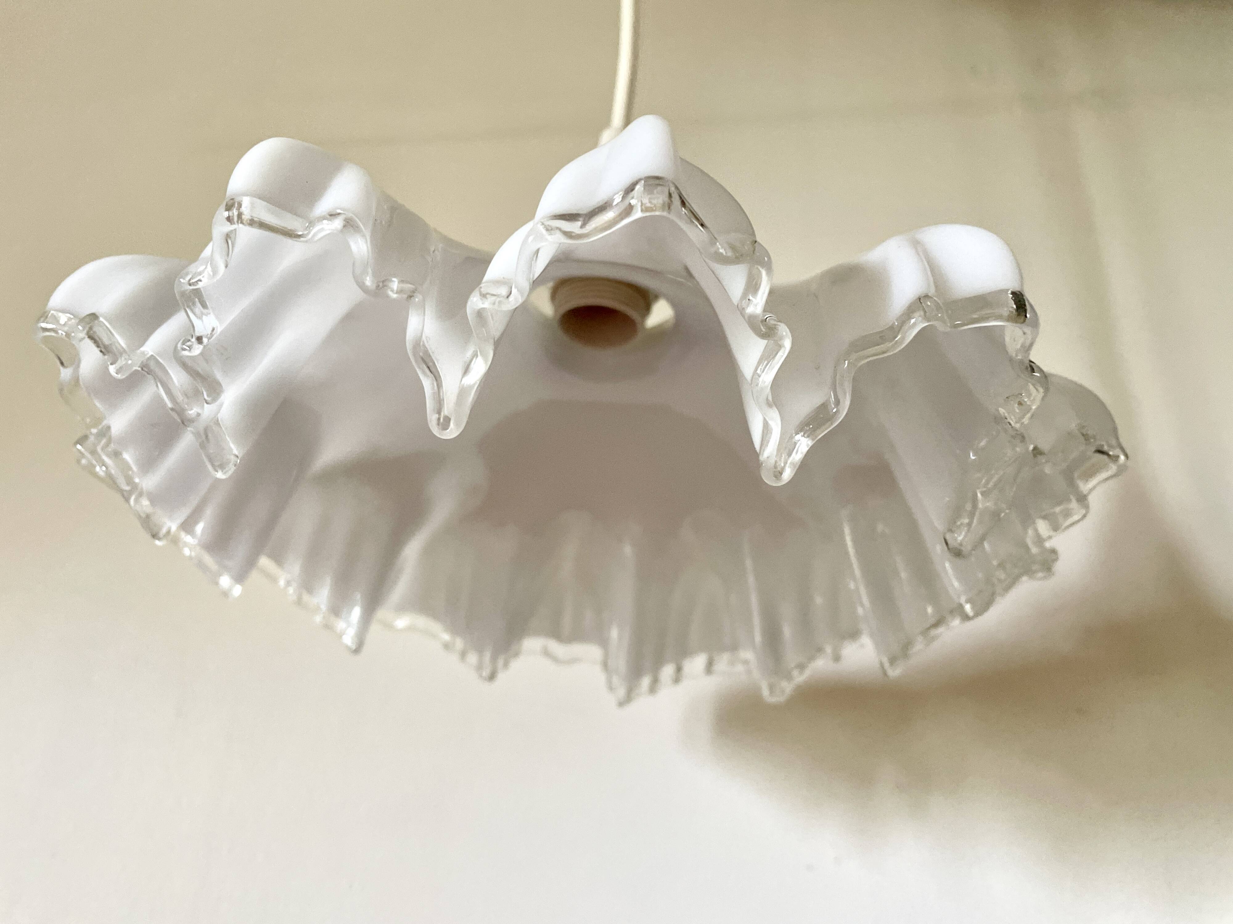 White glass draped suspension