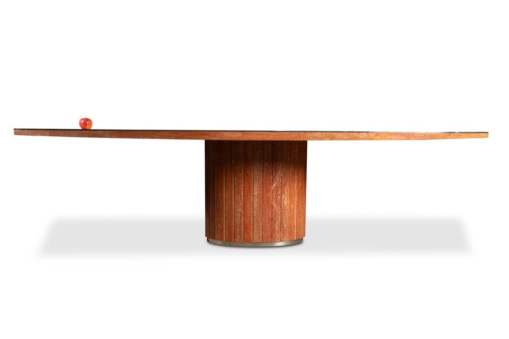 Willy Rizzo. Large table in orange-red travertine. 1970s.