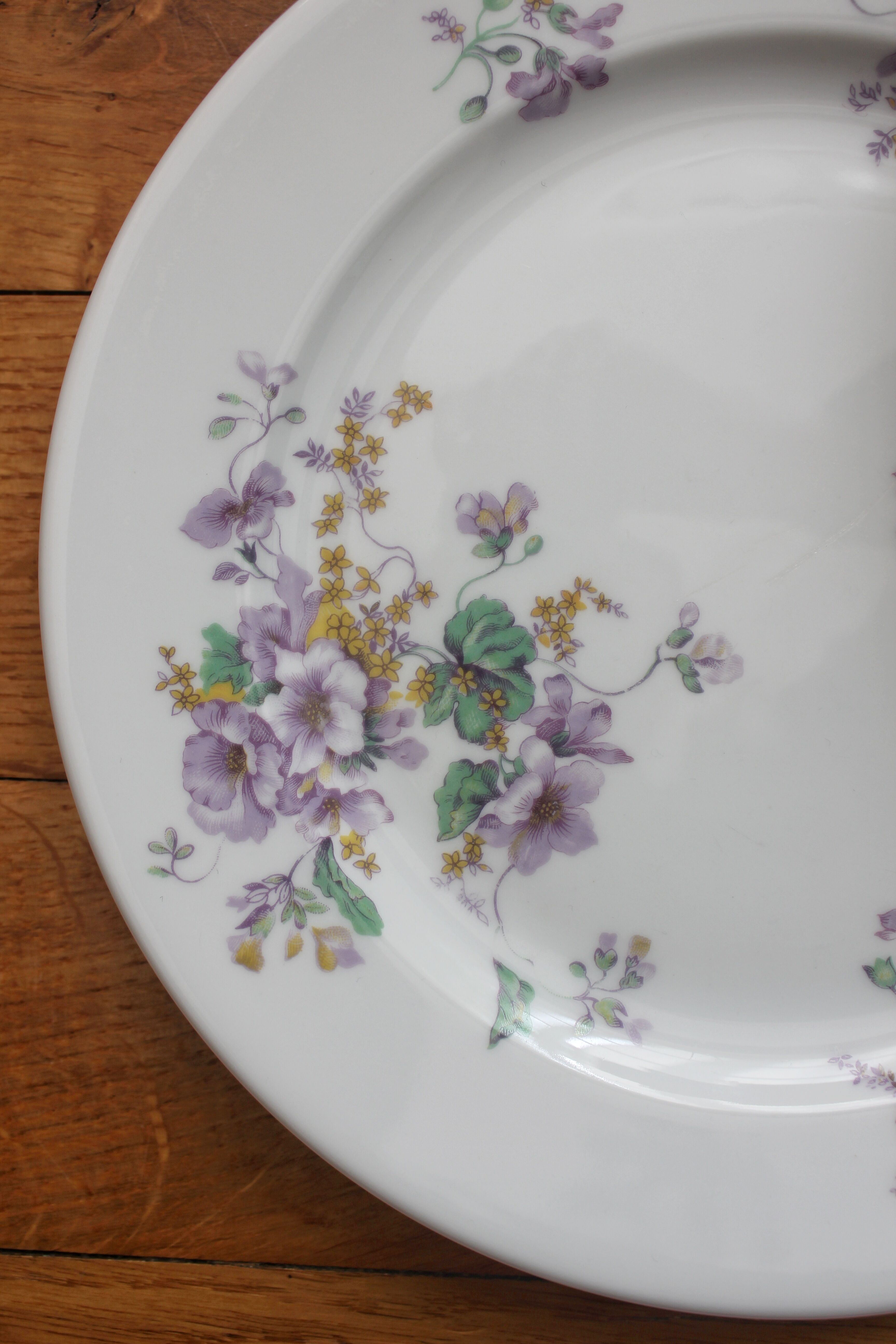 4 porcelain dessert plates decorated with flowers Bernardaud Limoges