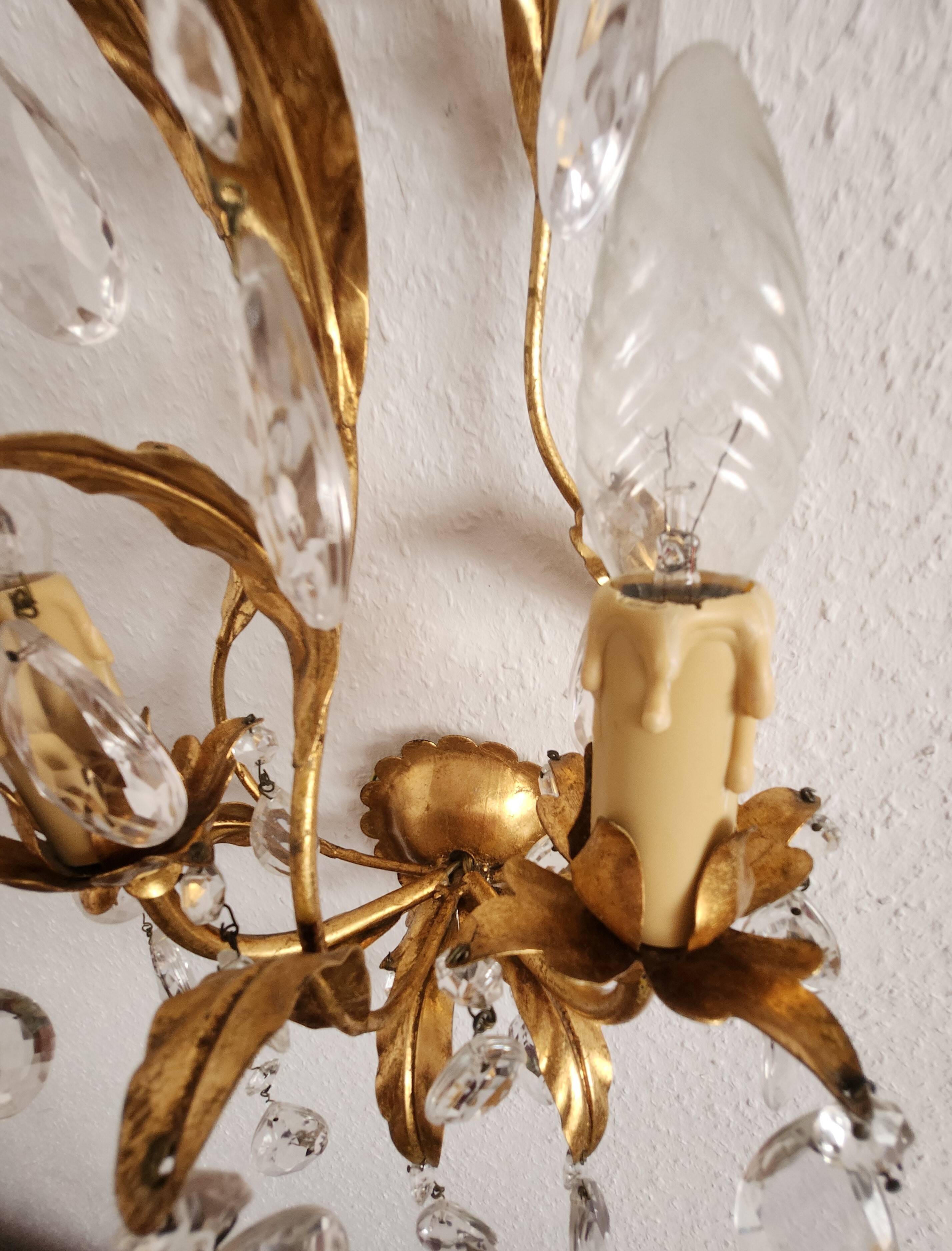 Hand-forged wall lamp gilded with gold leaf and crystals, Italy