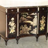 Contemporary Chinese buffet with a marble top and space for a mini-fridge.