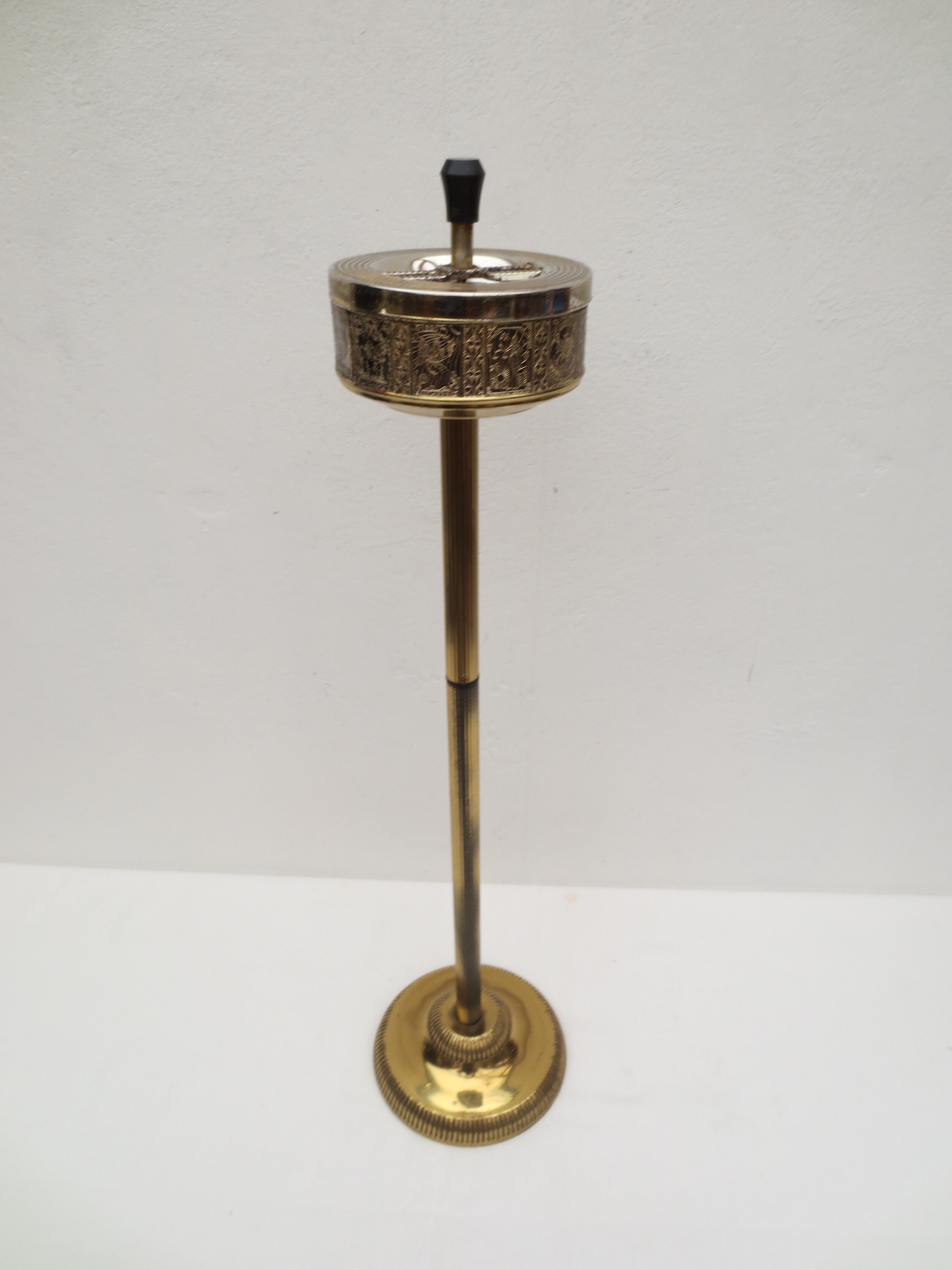 Old ashtray on foot year 50 in gilded brass