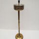 Old ashtray on foot year 50 in gilded brass