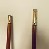 Pair of old oars in mahogany