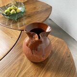 Glazed earthenware jug